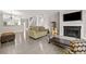 A spacious living room featuring modern furniture and a fireplace at 286 Blue Pointe Ct, Suwanee, GA 30024