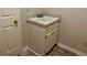 Half bathroom featuring a single sink vanity and tile floor at 3222 Wyndham Park Ct, Decatur, GA 30034