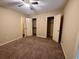 Bedroom with ceiling fan, carpet, neutral walls, and closet storage space at 3222 Wyndham Park Ct, Decatur, GA 30034
