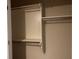 Bright walk-in closet features built in storage solutions with shelves and racks at 3222 Wyndham Park Ct, Decatur, GA 30034