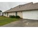 Home exterior with a large garage and driveway at 3222 Wyndham Park Ct, Decatur, GA 30034