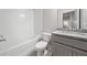 Bathroom featuring a tub, toilet, vanity, and granite countertop at 3760 Oxford Cir, Doraville, GA 30340