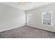 Bedroom with neutral carpet and windows at 3760 Oxford Cir, Doraville, GA 30340