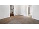 Spacious bedroom with carpeted floors and multiple doorways at 3760 Oxford Cir, Doraville, GA 30340