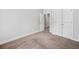 Bedroom features neutral carpet and white doors at 3760 Oxford Cir, Doraville, GA 30340