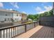 Overlooking backyard deck area with view of the nearby pool at 3760 Oxford Cir, Doraville, GA 30340