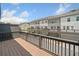 Relaxing backyard deck and adjacent townhomes at 3760 Oxford Cir, Doraville, GA 30340
