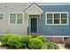 Welcoming front entrance with well-maintained landscaping, and a charming, covered entryway at 3760 Oxford Cir, Doraville, GA 30340