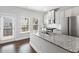 Bright kitchen with granite countertops, stainless appliances, and an adjacent outdoor deck at 3760 Oxford Cir, Doraville, GA 30340
