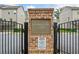 Entrance sign for Kensington Gates, gated community at 3760 Oxford Cir, Doraville, GA 30340