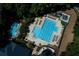 Aerial view of a community pool area with a large pool and lounge chairs at 4311 Sentinel Nw Pl, Kennesaw, GA 30144