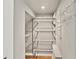 Walk-in closet features adjustable wire shelving for customized storage solutions at 4311 Sentinel Nw Pl, Kennesaw, GA 30144