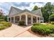 Inviting community center with a wraparound porch and lush landscaping at 4311 Sentinel Nw Pl, Kennesaw, GA 30144