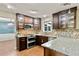 Gourmet kitchen featuring stainless steel appliances, granite countertops, and custom backsplash at 4311 Sentinel Nw Pl, Kennesaw, GA 30144