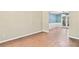 Open living room with hardwood floors leads to the dining room at 4311 Sentinel Nw Pl, Kennesaw, GA 30144