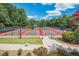Community pickleball courts surrounded by greenery at 4311 Sentinel Nw Pl, Kennesaw, GA 30144
