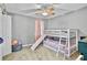 Charming bedroom with a bunk bed, ceiling fan, and gray walls at 4330 Volnay Ne Ct, Marietta, GA 30066