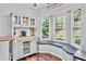 Charming breakfast nook with custom bench seating and backyard views at 4330 Volnay Ne Ct, Marietta, GA 30066