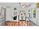 Charming kitchen featuring hardwood floors, stainless appliances, and a cozy breakfast nook at 4330 Volnay Ne Ct, Marietta, GA 30066