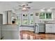 Well-lit kitchen with a breakfast nook, complete with bench seating and backyard views at 4330 Volnay Ne Ct, Marietta, GA 30066