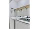 Laundry room featuring a new washer and dryer with a wood shelf at 4330 Volnay Ne Ct, Marietta, GA 30066