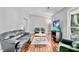 Bright living room with hardwood floors, vaulted ceilings, and comfortable seating arrangement at 4330 Volnay Ne Ct, Marietta, GA 30066
