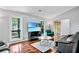 Cozy living room features hardwood floors, ample natural light, and stylish decor at 4330 Volnay Ne Ct, Marietta, GA 30066