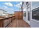 A spacious wooden deck offers an inviting outdoor space for relaxation or entertaining at 1309 Bennett Creek Ovlk, Suwanee, GA 30024