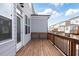 A spacious wooden deck offers an inviting outdoor space for relaxation or entertaining at 1309 Bennett Creek Ovlk, Suwanee, GA 30024