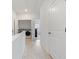 Hallway leading to the laundry room and other rooms in the house at 1309 Bennett Creek Ovlk, Suwanee, GA 30024