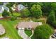 Expansive aerial view showcasing the home's well-manicured lawn, mature trees, and inviting curb appeal at 2139 Bramlett Nw Pl, Marietta, GA 30064