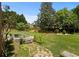Picturesque backyard with a stone patio, lush greenery, and a tranquil setting perfect for outdoor enjoyment at 2139 Bramlett Nw Pl, Marietta, GA 30064