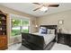 Bedroom with a double bed, large window, and neutral colored walls at 2139 Bramlett Nw Pl, Marietta, GA 30064