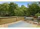 Relaxing deck with comfortable seating and scenic views of the surrounding greenery, ideal for outdoor dining at 2139 Bramlett Nw Pl, Marietta, GA 30064