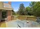 Cozy deck with outdoor seating overlooking the landscaped backyard, perfect for enjoying the outdoors at 2139 Bramlett Nw Pl, Marietta, GA 30064