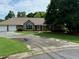 Beautiful single-story home with a stone accent, a two-car garage, and a landscaped front yard with shade trees at 2139 Bramlett Nw Pl, Marietta, GA 30064