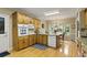 Traditional kitchen with wooden cabinets, hardwood floors, granite countertops, and stainless steel appliances at 2139 Bramlett Nw Pl, Marietta, GA 30064