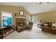 Comfortable living room with a brick fireplace, large windows, and stylish furnishings for a relaxing atmosphere at 2139 Bramlett Nw Pl, Marietta, GA 30064