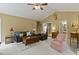 Large living room with neutral carpet, vaulted ceiling, and a variety of comfortable seating options at 2139 Bramlett Nw Pl, Marietta, GA 30064