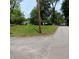Street view of vacant lot offering development opportunities in a well-established and treed community at 2637 Johnson St, Lithonia, GA 30058