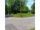 Street view of vacant lot presenting a blank canvas for your new home or development in a growing area at 2637 Johnson St, Lithonia, GA 30058