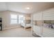 Spacious bedroom with two sets of bunk beds and natural light at 3715 Bridges Ct, Cumming, GA 30040