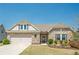 Charming single Gathering home featuring stone accents, a two-car garage, and a well-manicured lawn at 3715 Bridges Ct, Cumming, GA 30040