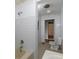 Bathroom featuring tile walls, and a tub-shower combo at 6296 Longino Drive, Union City, GA 30291