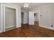 Spacious bedroom boasts hardwood floors and ample closet space at 6296 Longino Drive, Union City, GA 30291