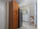 Functional laundry room with washer, dryer, and ample storage cabinets at 6296 Longino Drive, Union City, GA 30291