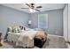 Charming bedroom featuring soft colors and a comfortable bed at 7370 N Mitchell Ct, Villa Rica, GA 30180