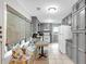 Kitchen features a breakfast nook with window seating, gray cabinetry and tile flooring at 7370 N Mitchell Ct, Villa Rica, GA 30180
