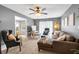 Living room features neutral colors, modern furnishings and an open-concept layout at 7370 N Mitchell Ct, Villa Rica, GA 30180