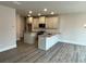 Open-concept kitchen with granite countertops, island, and modern appliances at 1058 Crest Mill Dr, Marietta, GA 30008